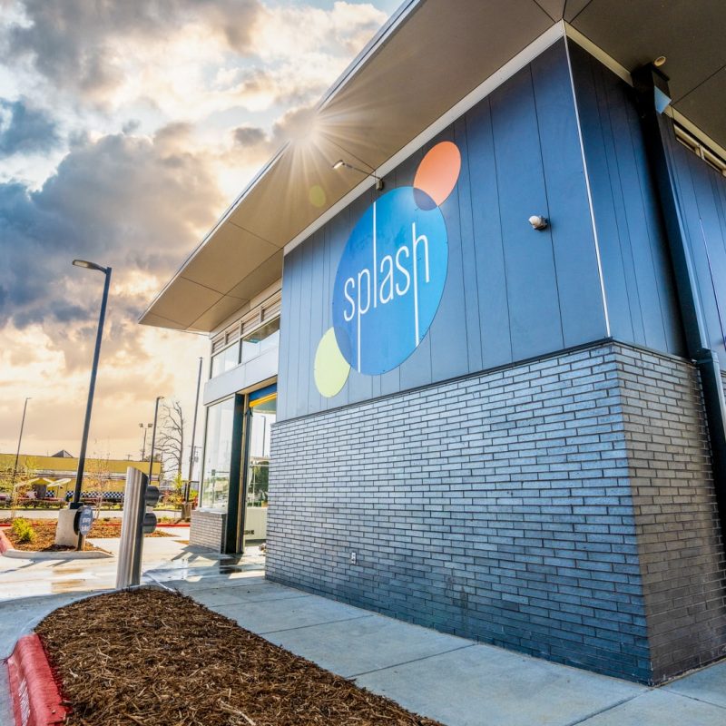 Side of Sherwood Splash Car Wash building with Splash logo.